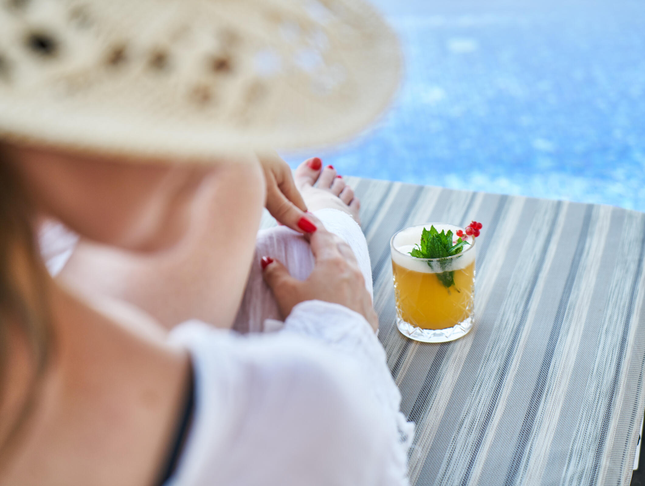Privacy and luxury all rolled into one lounging by the pool with a cocktail